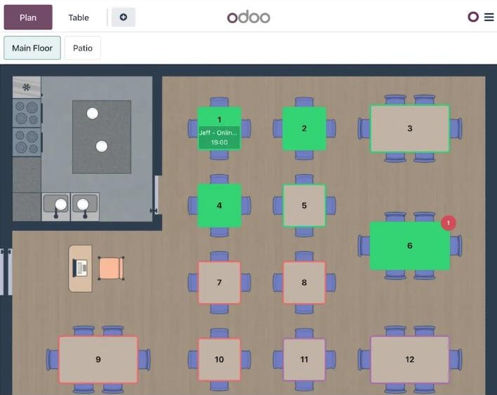 Plan de salle Odoo avec tables numérotées et une réservation en ligne